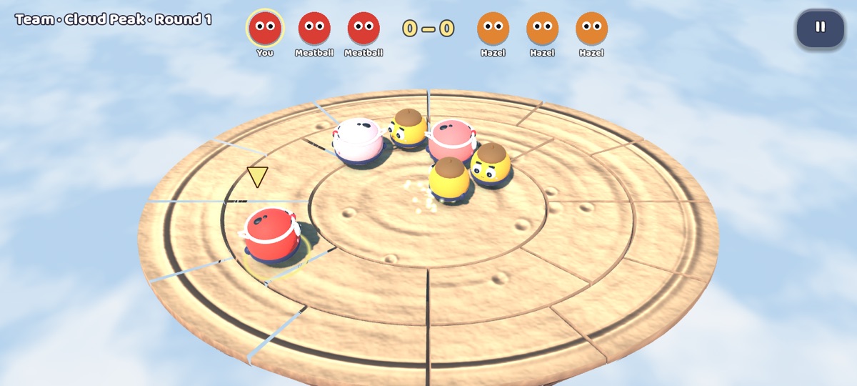 A team match: three red sumos against three blue ones on a pinball table